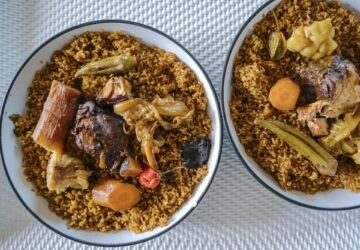 A picture shows thieboudiene plates, also known as Ceebu jÎn (literally "rice with fish" in wolof) in the Almadies area in Dakar, Senegal
